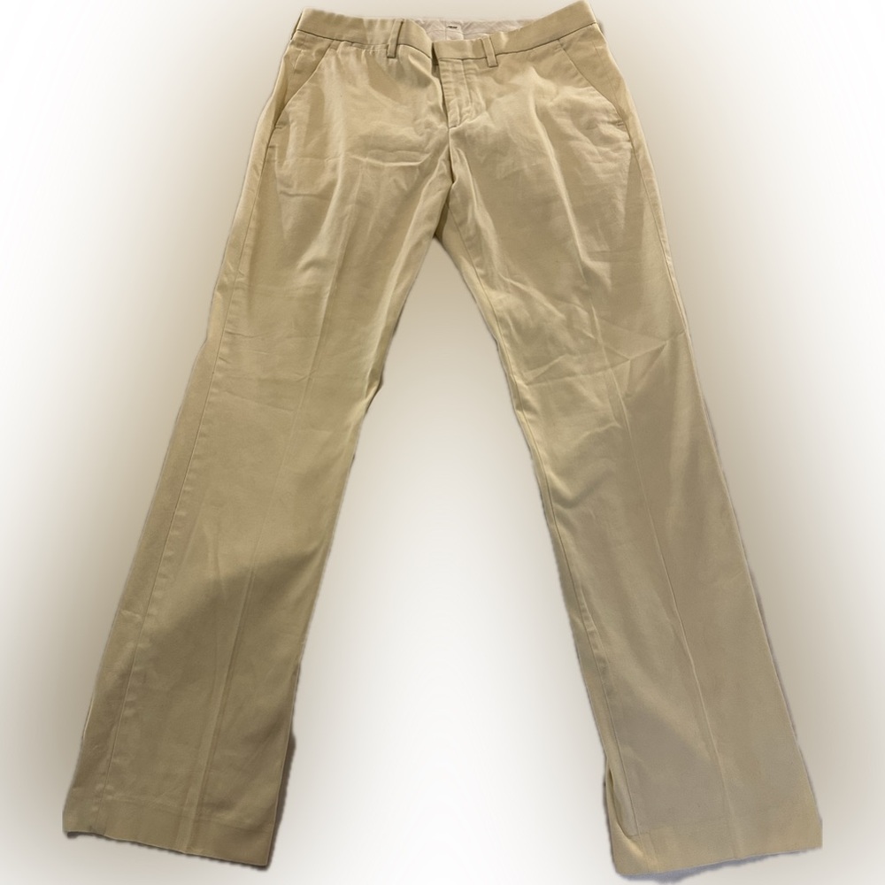 Men’s pale, yellow colored express photographer, dress pants size 31 x 32